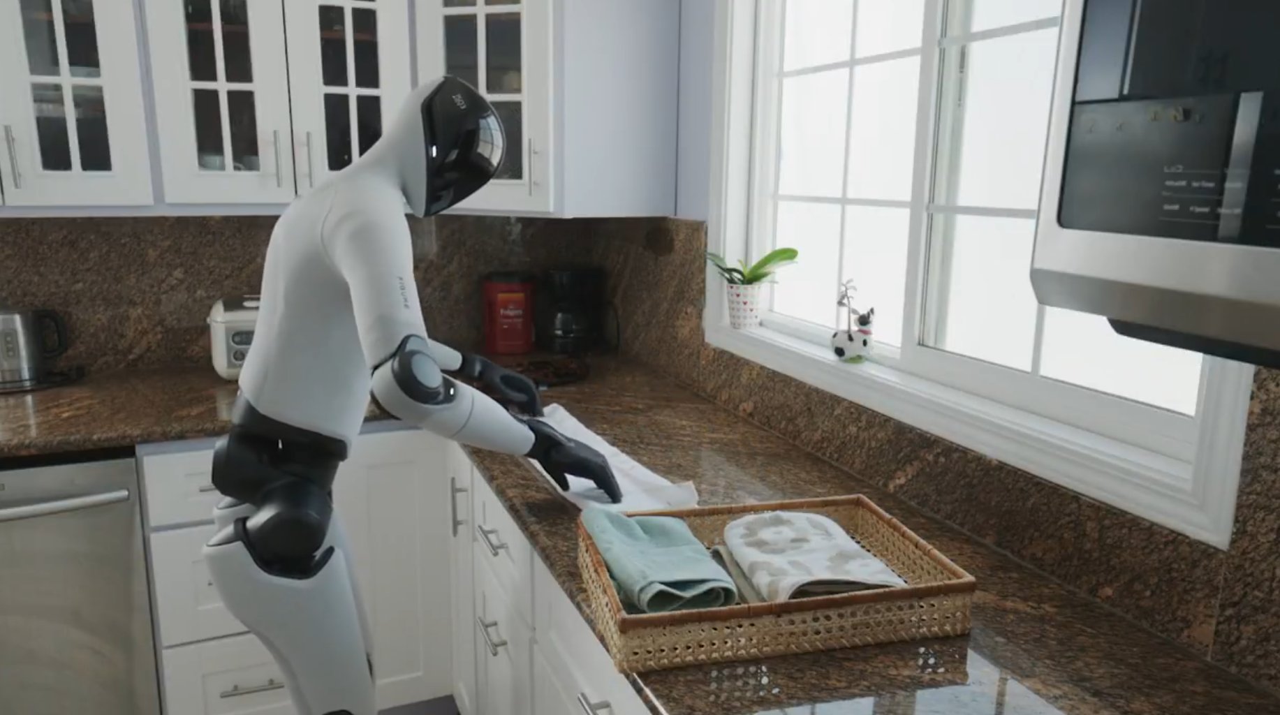 Figure humanoid robot performing household tasks